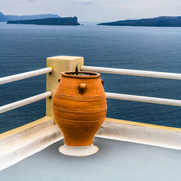 The large picturesque terrace on Santorini island offers views of the Aegean sea and the Caldera of an ancient volcano.