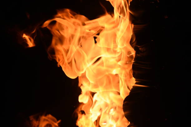 istock A pillar of fire against a black background 1038846684