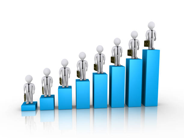 istock Businessmen on top of graph columns 1038851896