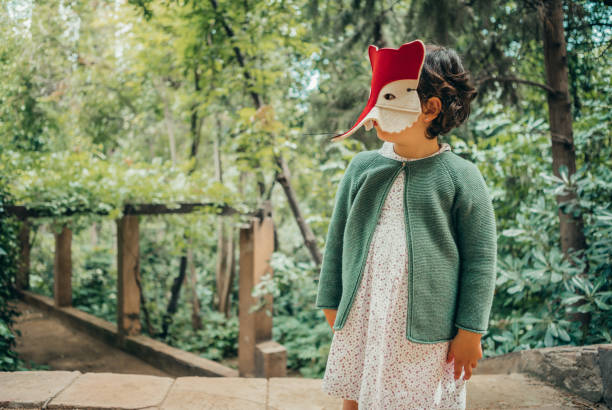 Girl wearing animal mask