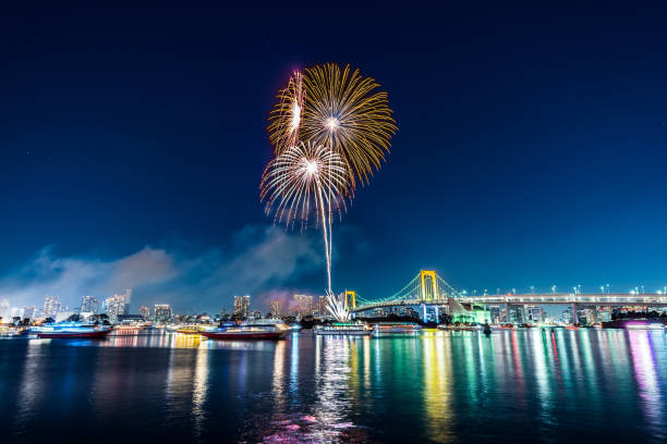 istock city skyline view of tokyo bay, firework, rainbow bridge 1038851964