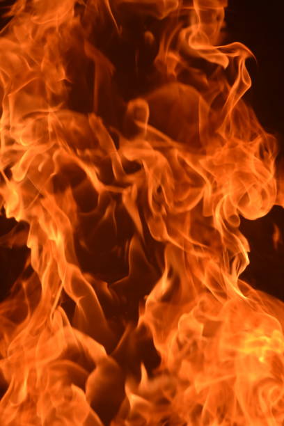 istock A pillar of fire against a black background 1038856150