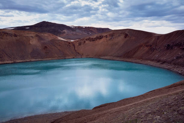 istock Turquoise crater lake 1038863340