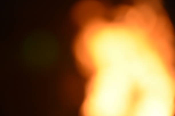 istock A pillar of fire against a black background 1038863438