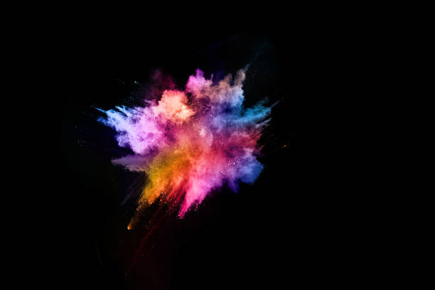 istock abstract colored dust explosion on a black background. abstract powder splatted background,Freeze motion of color powder exploding/throwing color powder, multicolored glitter texture. 1038863620