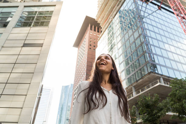 istock Young Woman in Big City 1038871202