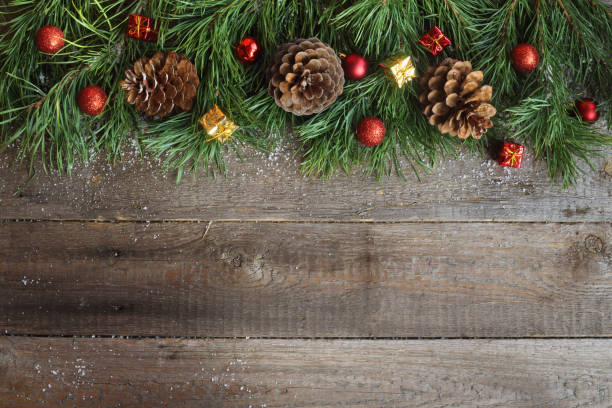 istock Christmas card on wooden background 1038877120