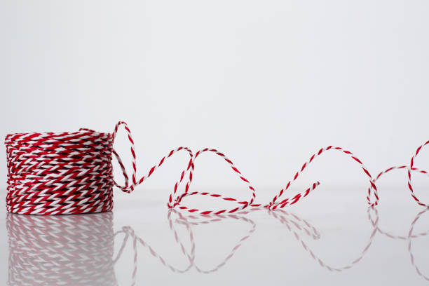 Red and white rope reel