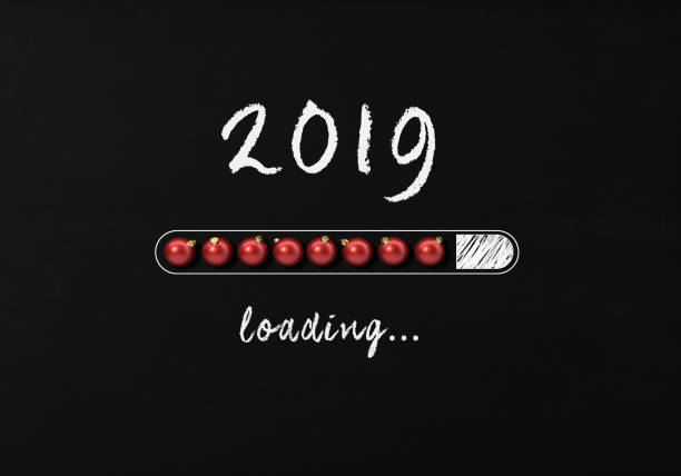 Chalk Drawing: New Year 2019 Loading On Blackboard Chalk Drawing: New year 2019 loading on Blackboard. 2019 loading writes on blackboard with a chalk effect. There is a loading bar made of baubles on the blackboard. Horizontal composition with copy space. 2019 new year resolution stock pictures, royalty-free photos & images