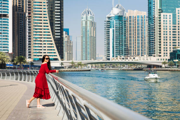istock Girl enjoying a Dubai marina view 1038892970
