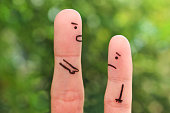 Fingers art of people. Concept of man scolding child.