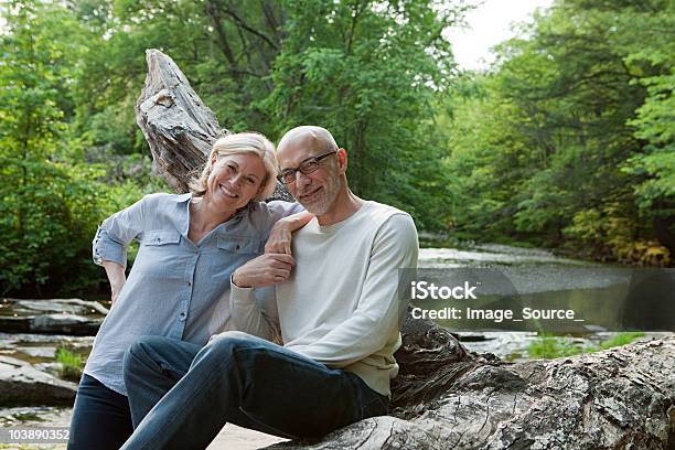 Mature Couple Outdoors In Rural Scene Stock Photo - Download Image Now - 60-64 Years, Mature Couple, Active Seniors