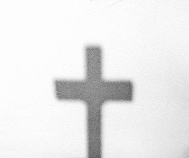 istock The Shadow of Christian Cross 1038910358