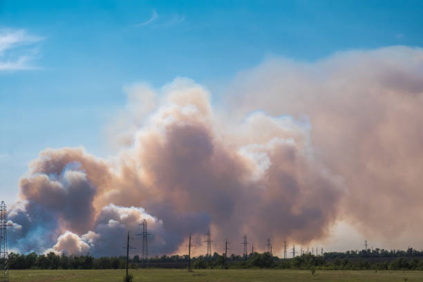 istock a big cloud of thick smoke rising from the ground 1038920172