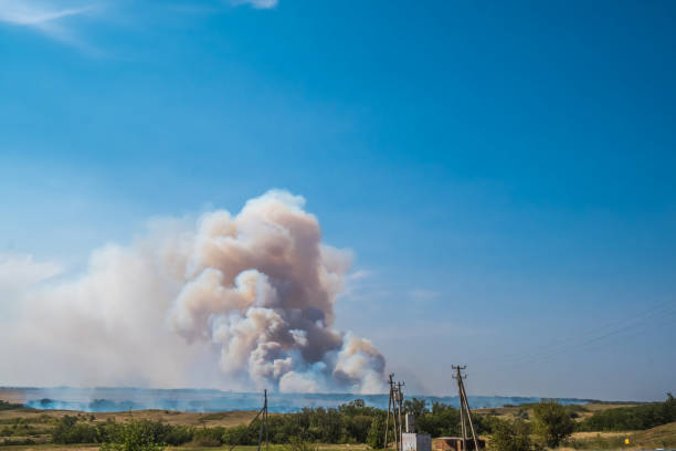 istock a big cloud of thick smoke rising from the ground 1038924174
