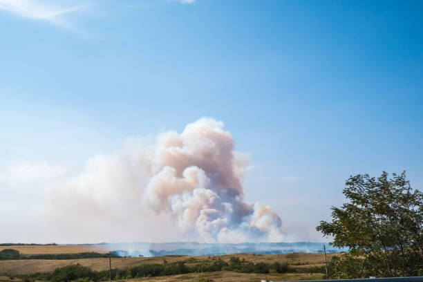 istock a big cloud of thick smoke rising from the ground 1038924768
