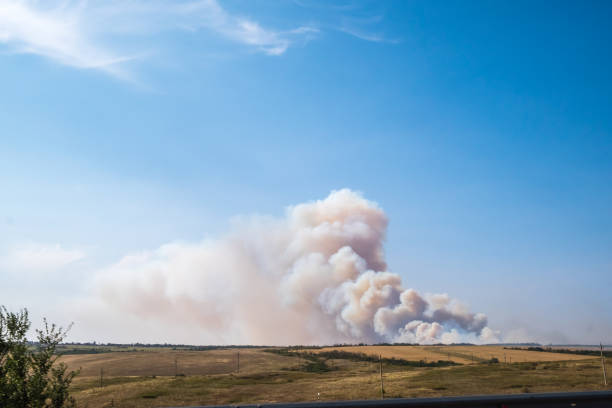 istock a big cloud of thick smoke rising from the ground 1038929222