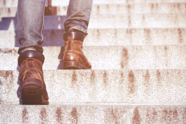 istock Close up legs of young hipster man 1038971810