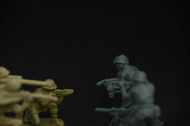 istock A toy soldier on a black background 1038975206