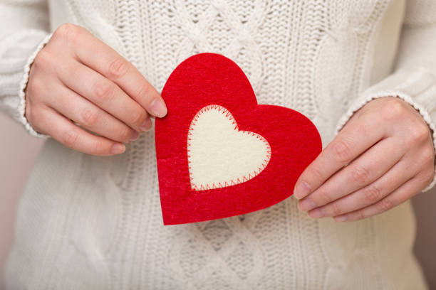 istock Woman holding a heart 1038977650