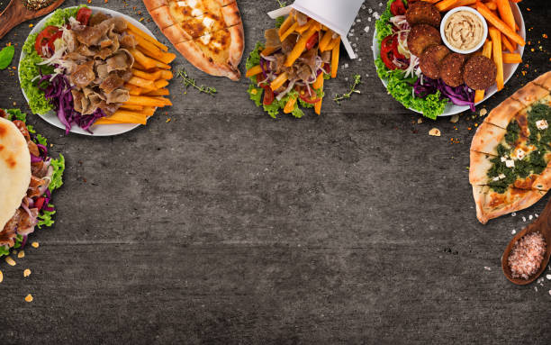 istock Top down view on traditional turkish meals on black stone table. 1038981060