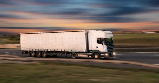 istock Small Truck on road, cargo transportation concept. 1038981286