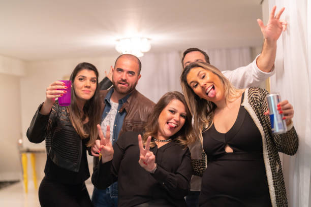 istock Friends Drinking and Having Fun at House Party 1038981288