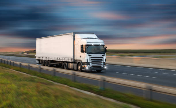 istock Small Truck on road, cargo transportation concept. 1038985414