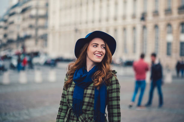 Smiling woman in Paris enjoying the city