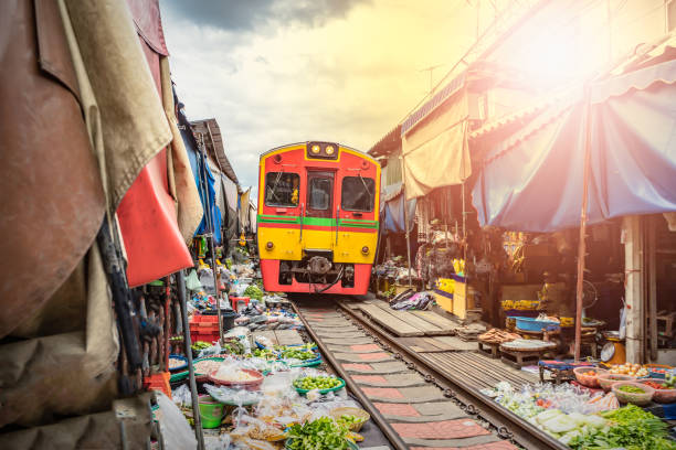 Umbrella market Maeklong Railway Train Market in Maeklong  Thailand stock photo