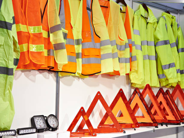 istock Reflective vests and plastic red emergency sign for car 1039041244