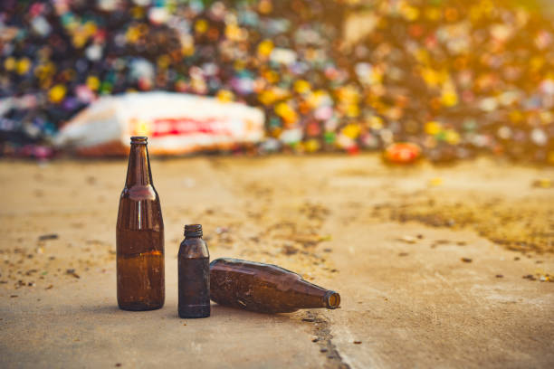 istock glass bottle for recycle on blurred glass bottle pile. 1039052414