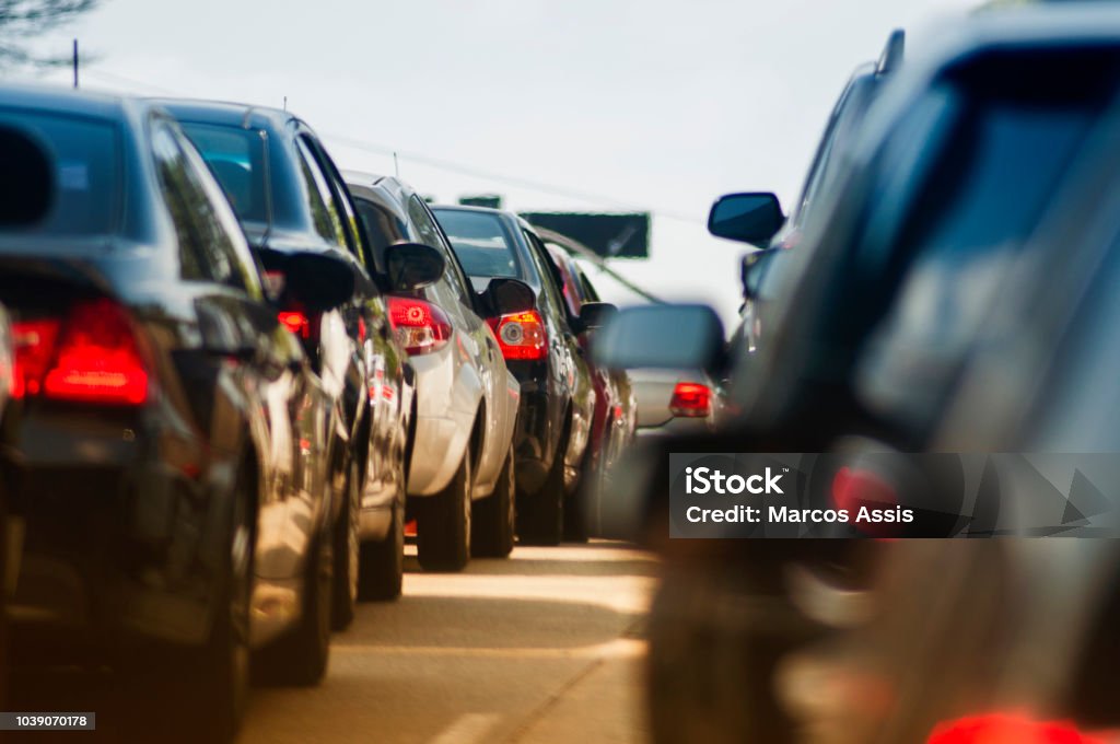 traffic jam on narrow street standing still traffic Traffic Stock Photo