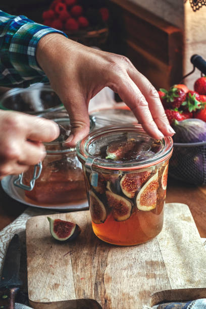 istock Preserving Figs with Honey in Jars 1039075632