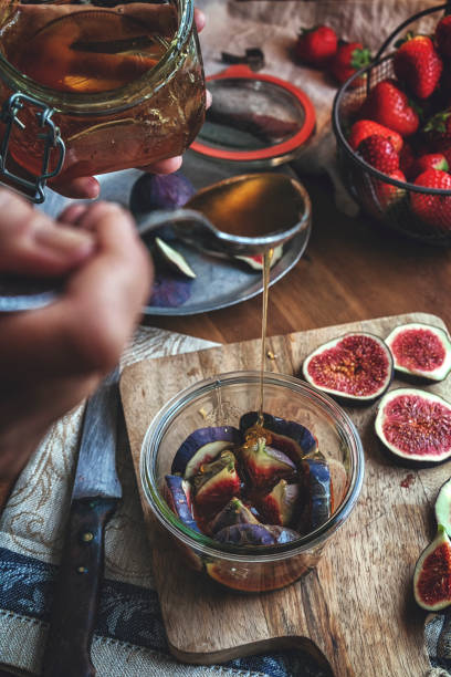 istock Preserving Figs with Honey in Jars 1039075668
