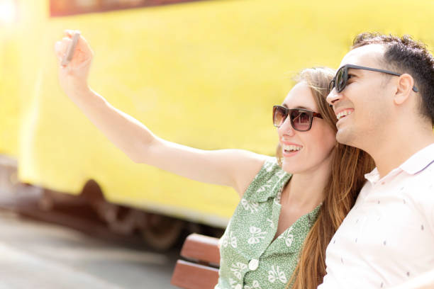 istock Young couple taking a selfie 1039083222