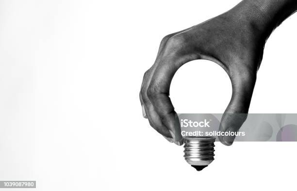 Light Bulb In Hand Stock Photo - Download Image Now - Innovation, Ideas, Light Bulb