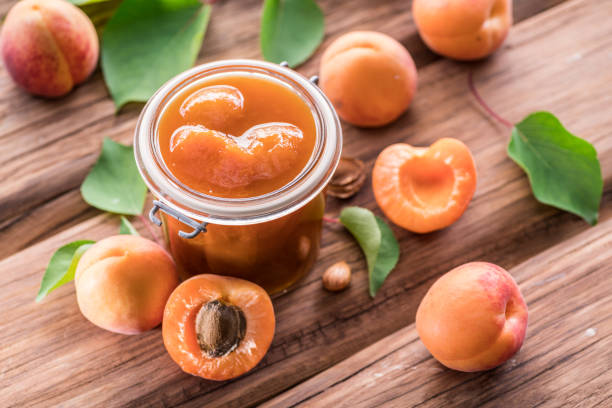 istock Apricot jam and ripe apricots. 1039098468
