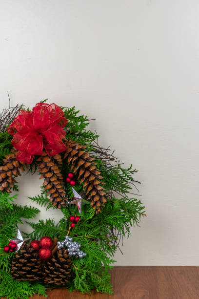istock A decorated Christmas wreath with copy space 1039110750