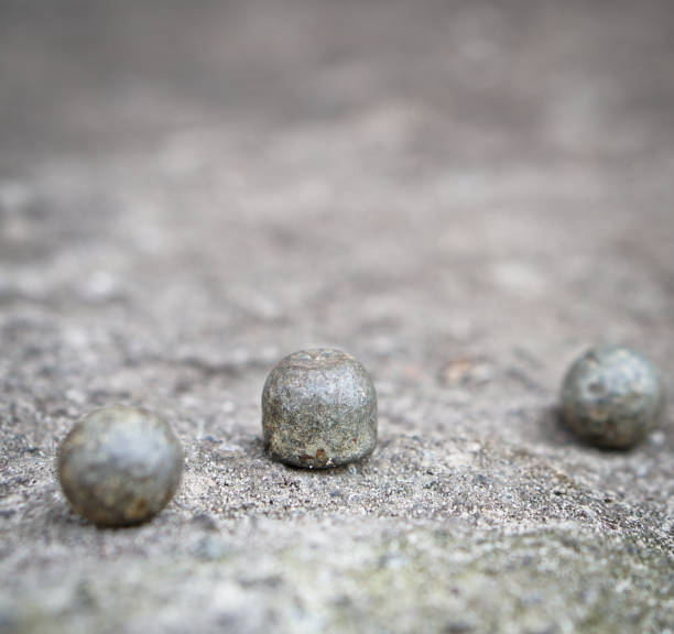 Ancient core for cannons and bullets. Antique historical artifact from the Middle Ages.