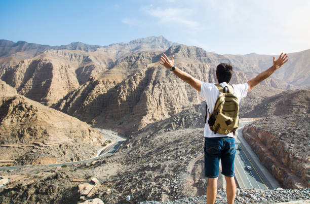 istock Male hiker enjoying the mountain view 1039132514