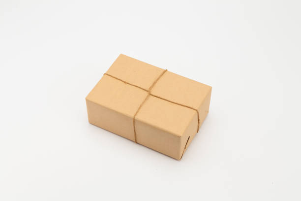 istock Brown kraft gift wrapped box on white 1039138342