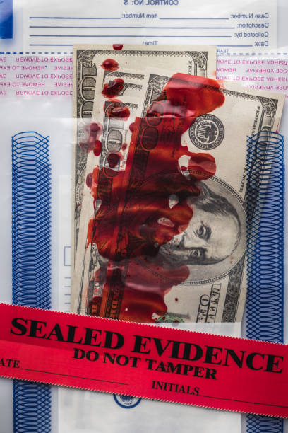 Crime scene Money with blood in evidence bag. Crime scene. bloody money stock pictures, royalty-free photos & images
