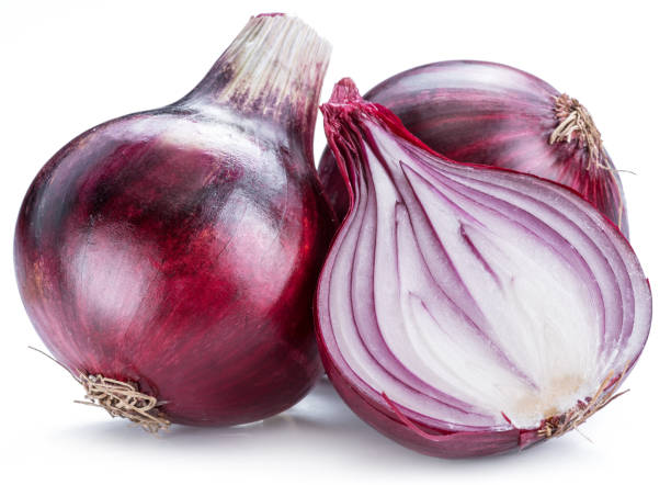 istock Red onion bulb and cross sections of onion. 1039146980