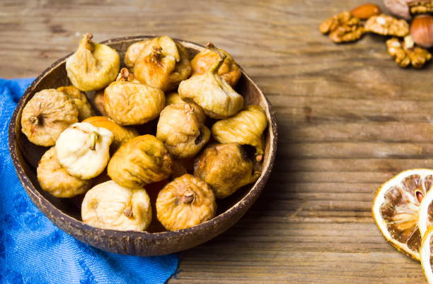 istock Dry figs in a rustic bowl tabletop shot 1039147894