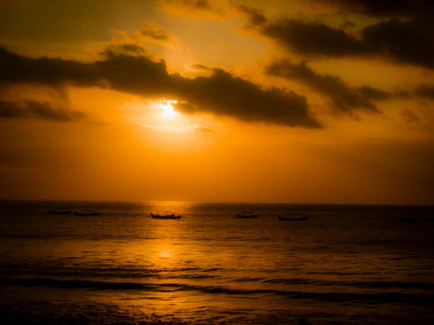 sunset at Kuta beach in Bali, Indonesia