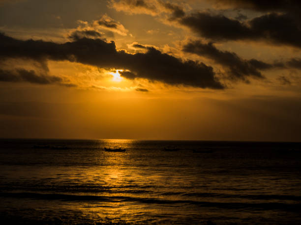 istock sunset at Kuta beach in Bali, Indonesia 1039181914