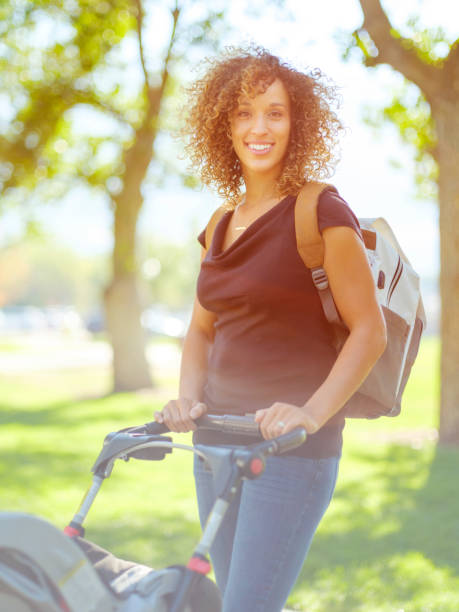 istock Young Mother in the Park 1039182306