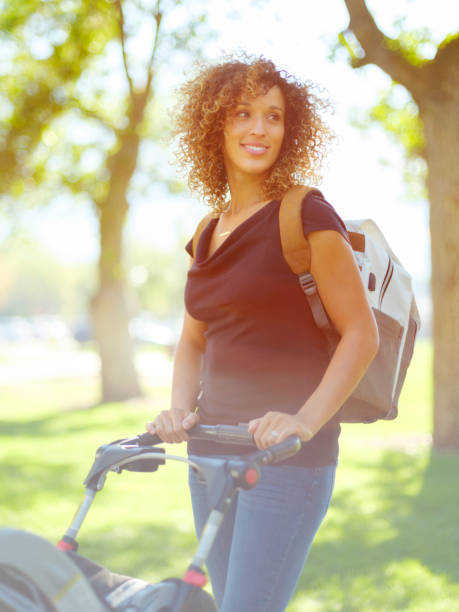 istock Young Mother in the Park 1039182550