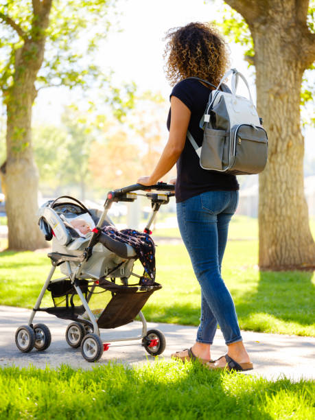 istock Young Mother in the Park 1039183342
